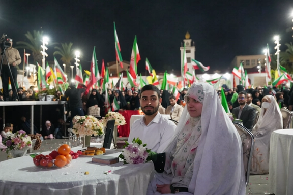 A couple in a mass wedding ceremony during a pro-government rally in Iran