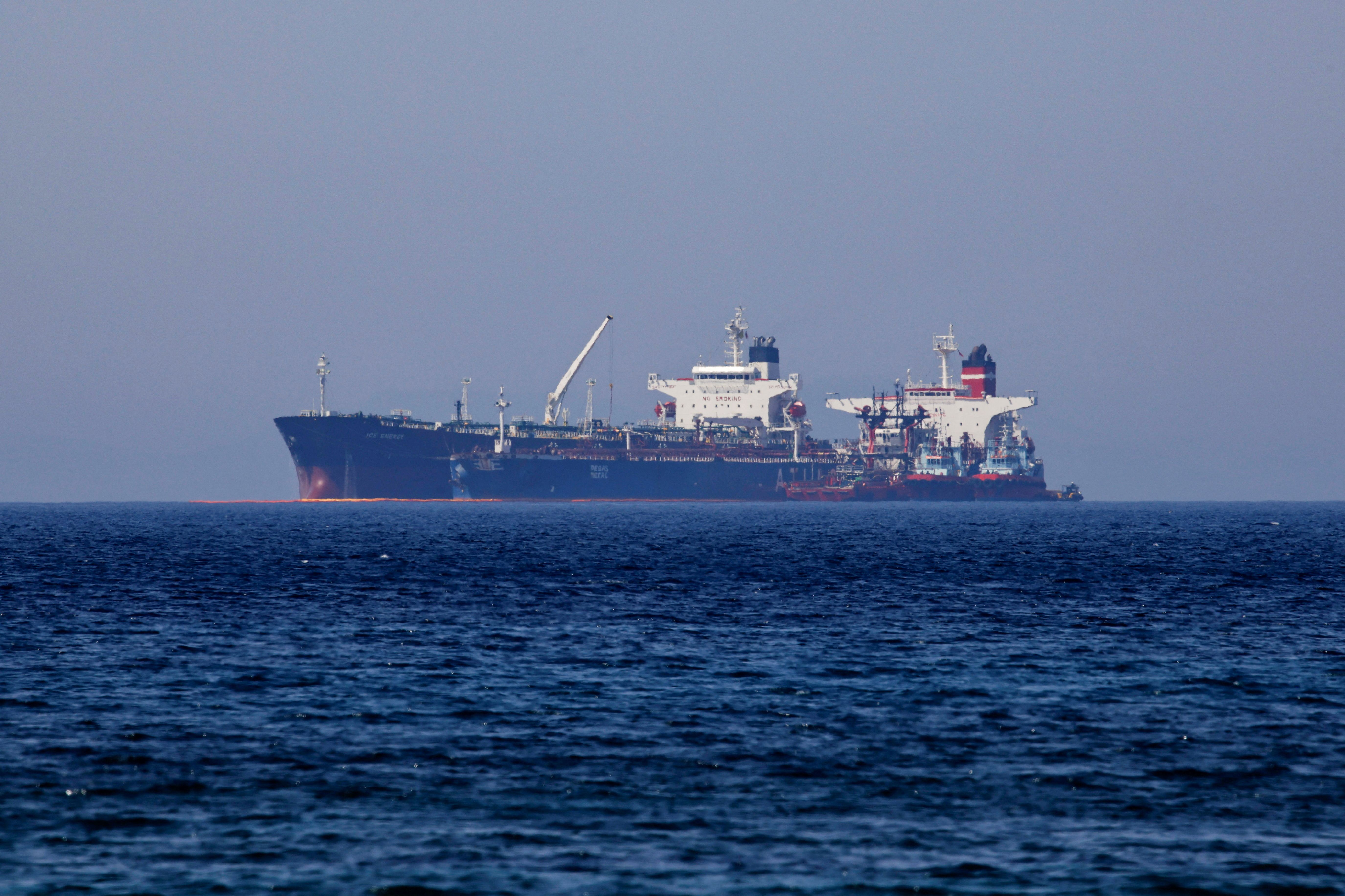 The Liberian-flagged oil tanker Ice Energy transfers crude oil from the Iranian-flagged oil tanker Lana (former Pegas), off the shore of Karystos, on the Island of Evia, Greece, May 26, 2022.