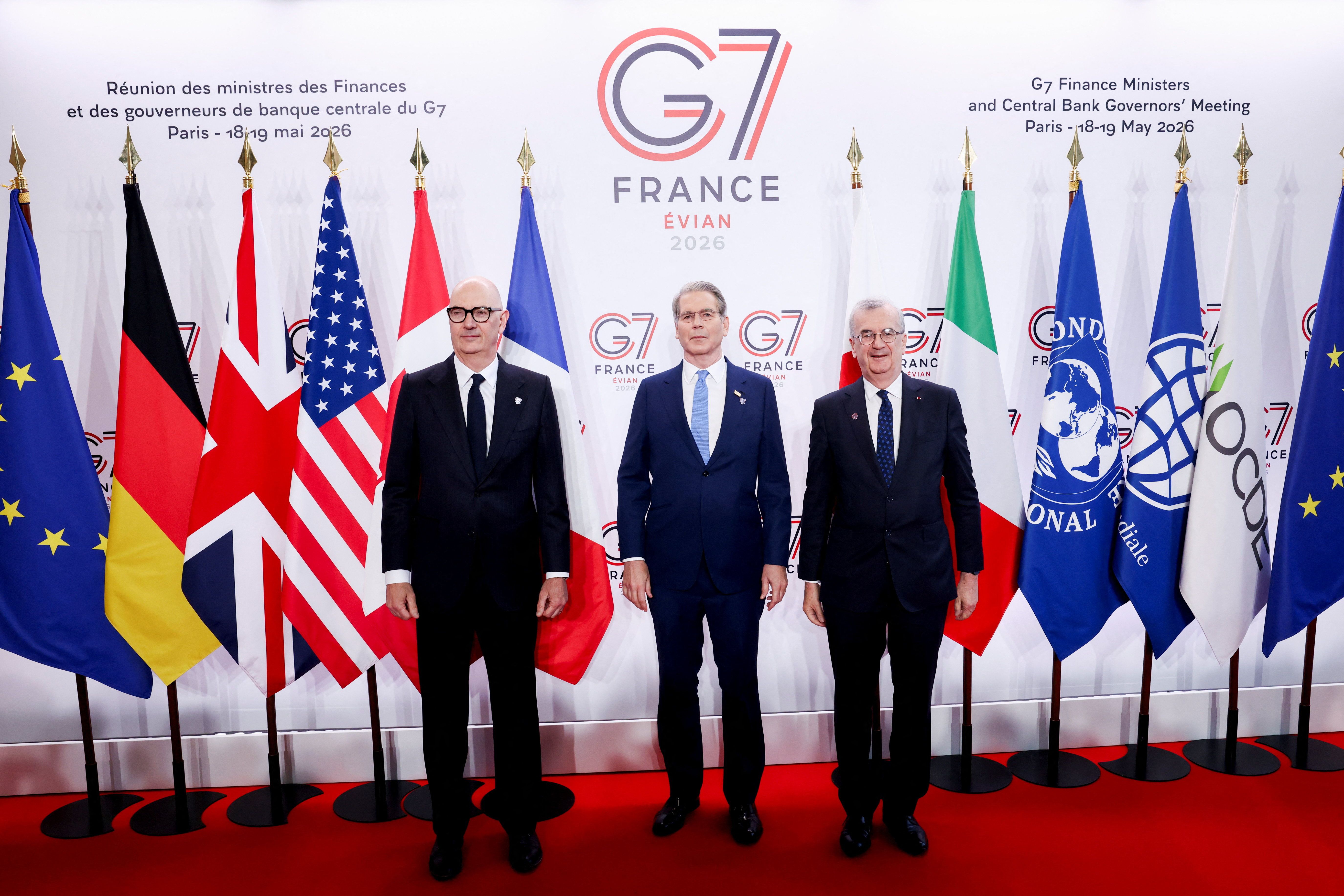 French Finance Minister Roland Lescure, US Treasury Secretary Scott Bessent, and Governor of Banque de France Francois Villeroy de Galhau pose for a photo ahead of a G7 finance ministers and central bank governors meeting in Paris on May 18, 2026. 