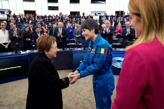 Iranian Nobel Peace Prize laureate Shirin Ebadi shakes hands with astronaut Samantha Cristoforetti during an event related to International Women's Day at the European Parliament in the French city of Strasbourg. (March 15, 2023)