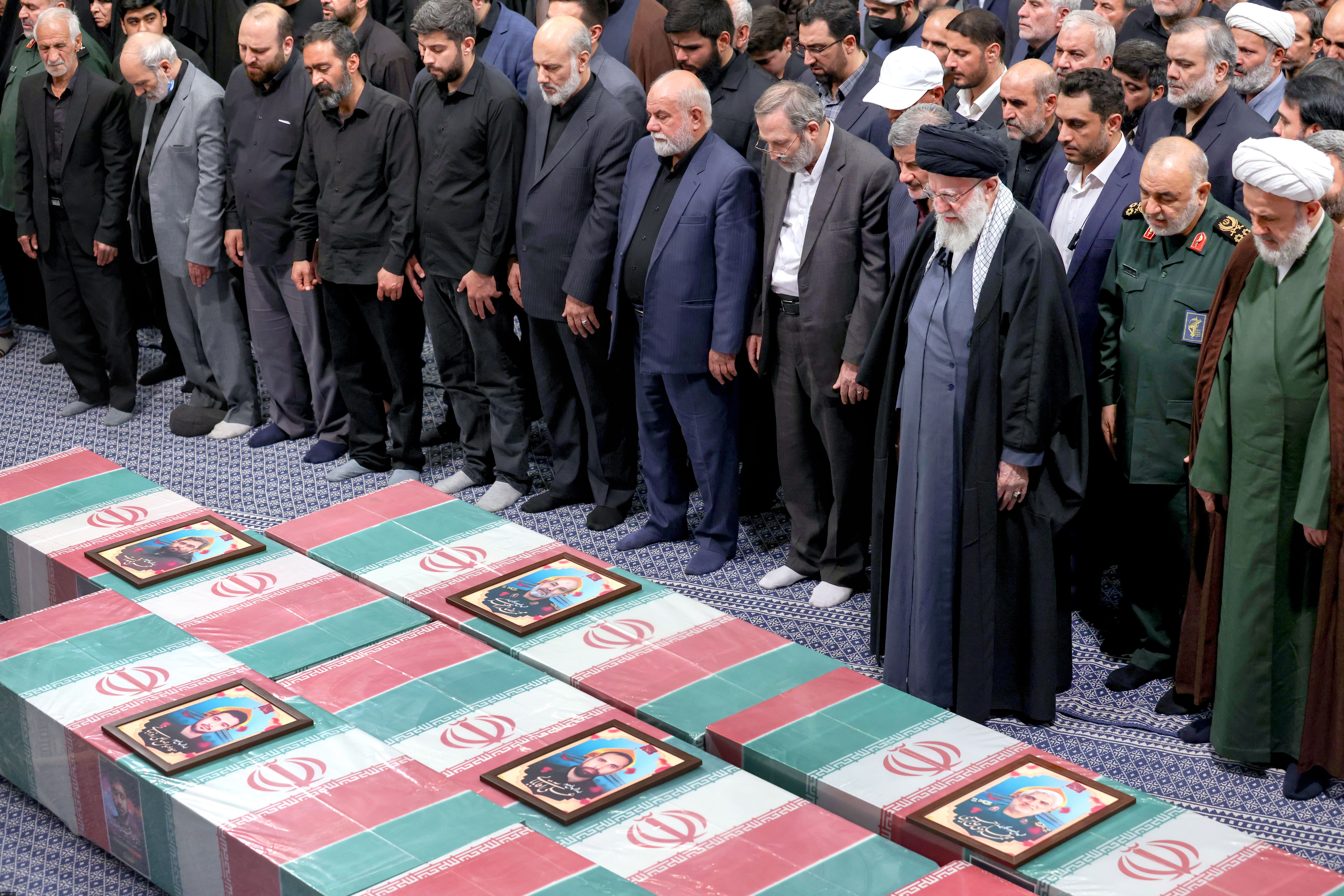 Iran's Supreme Leader Ali Khamenei leading a funeral prayer before the coffins of members of the Islamic Revolutionary Guard Corps who were killed in the Israeli airstrike on the Iranian consulate in the Syrian capital Damascus, Tehran, Iran, April 4, 2024  