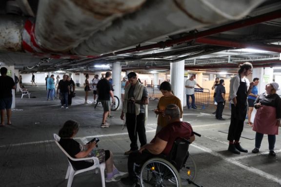 People take shelter amid missile attacks from Iran, in Tel Aviv, Israel, June 17, 2025.