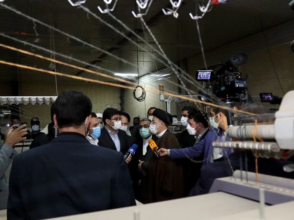 President Ebrahim Raisi visiting an idle textile factory in Yazd in December 2021.