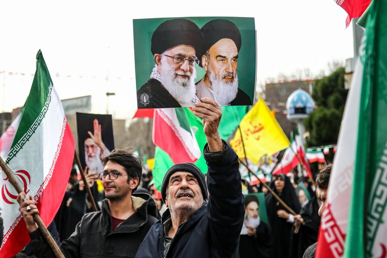 Tehran's cautious talk signals meet Revolution Day rhetoric