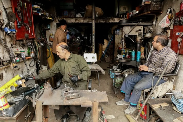 Iran’s truck repair hub feels the squeeze as work dries up
