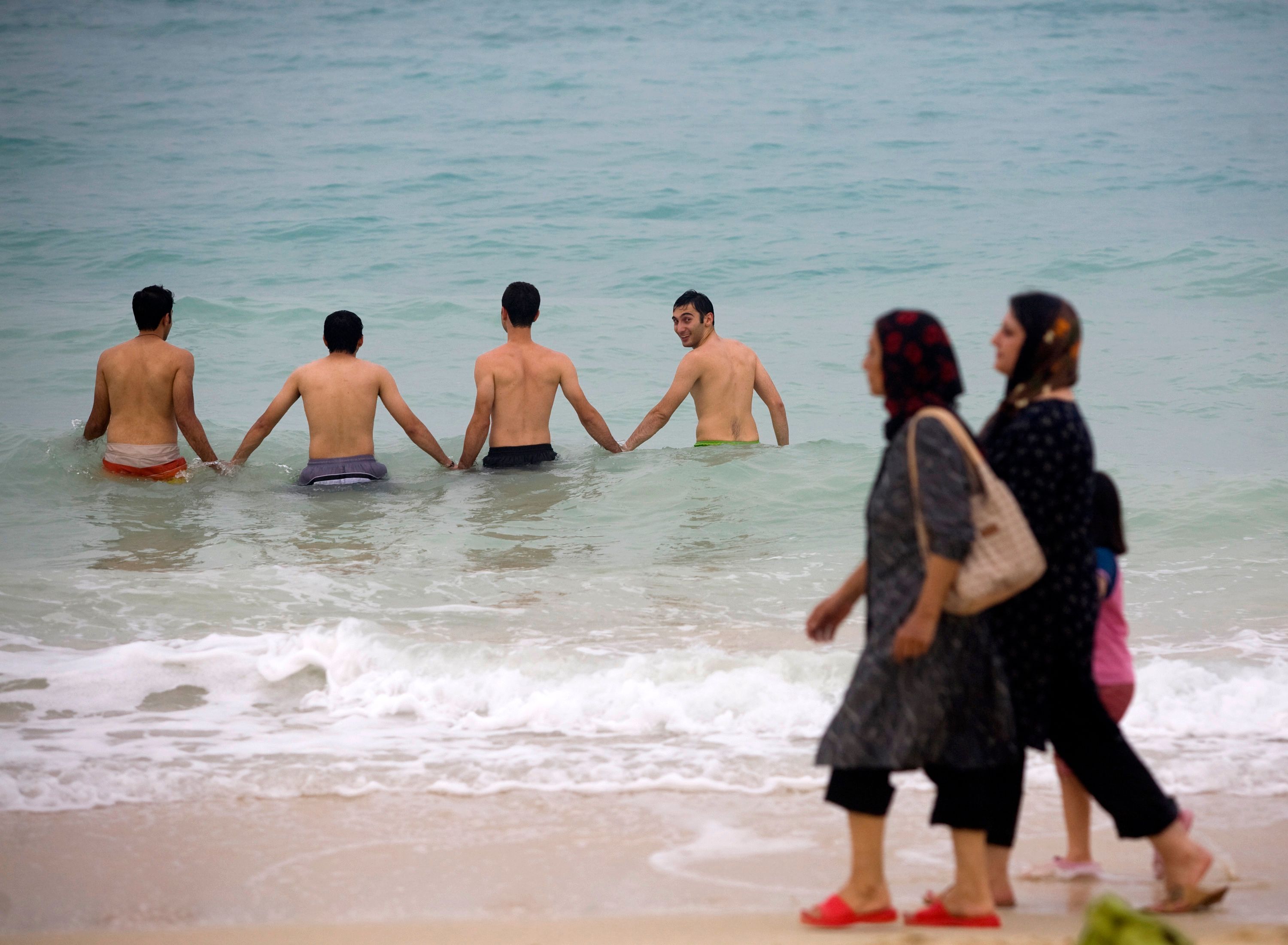 Women in Iran have to appear fully clothed even at beaches. Kish Island