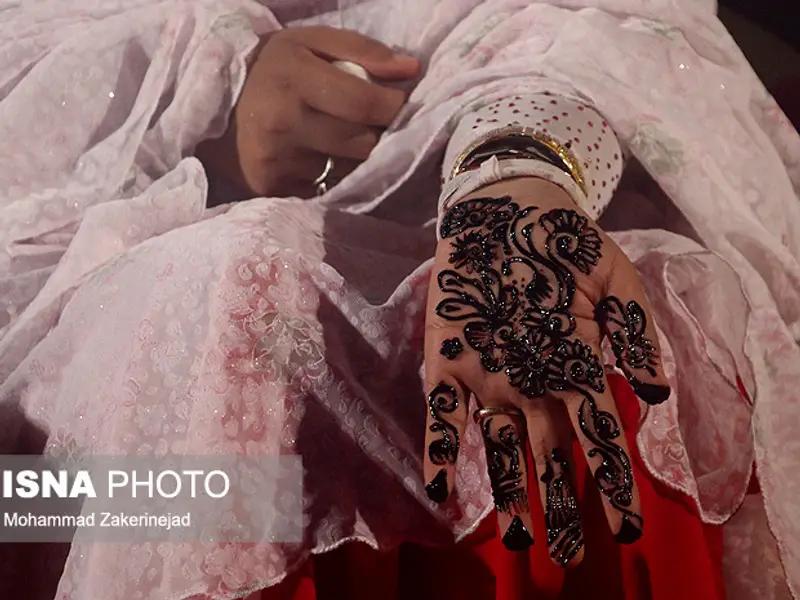 The hands of the bride are decorated with henna or hina in some wedding ceremonies in Iran, especially in southern regions (Undated)
