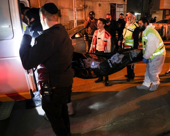 A body is taken away from the scene of a terror attack in Israel. March 29, 2022