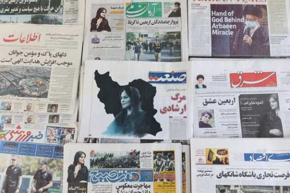 Newspapers, with a cover picture of Mahsa Amini, a 22-year-old woman who died in custody of the Islamic republic's "morality police" are seen in Tehran, Iran September 18, 2022.