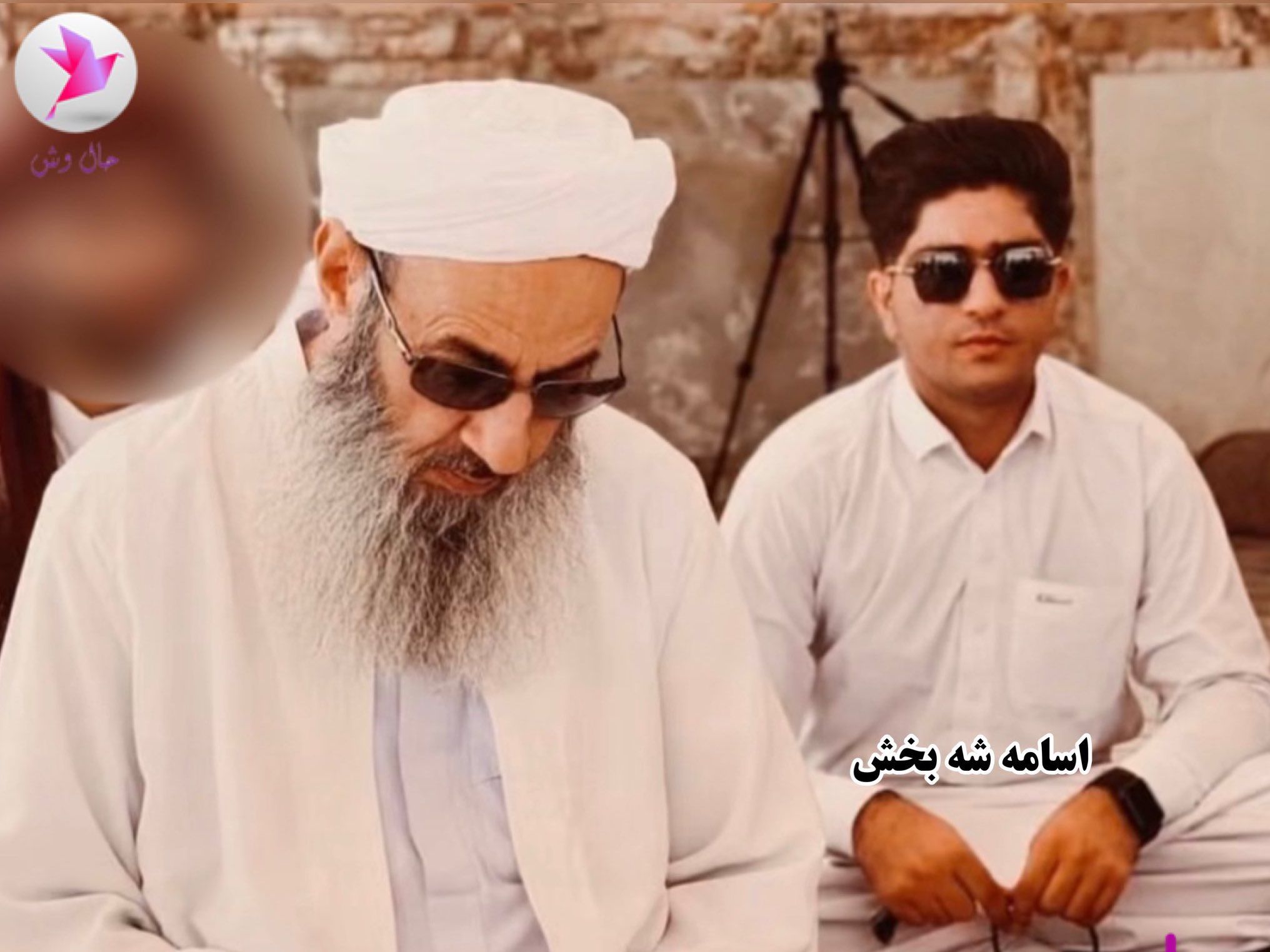 Sunni leader Mowlavi Abdolhamid is seen in a photo with Osameh Shahbakhsh, a cameraman of the Makki Mosque (undated)