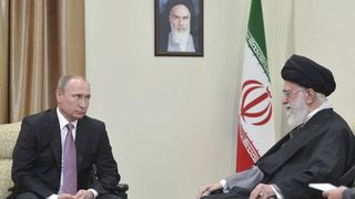 In Iran Tuesday, Putin Has Grain, Syria On Agenda