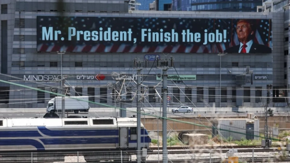 A billboard in Tel Aviv on Wednesday, June 18, 2025