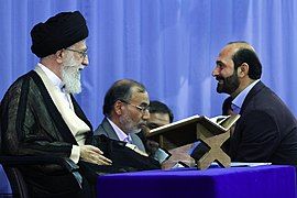 Iran’s ruler Ali Khamenei and Quran reciter Saeed Tooai (file photo) 