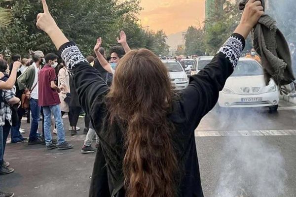 Iranian woman arrested for 'death to dictator' protest, eyewitness says