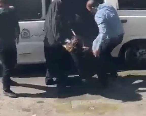 Hijab enforcement patrols arresting a woman violently in Tehran