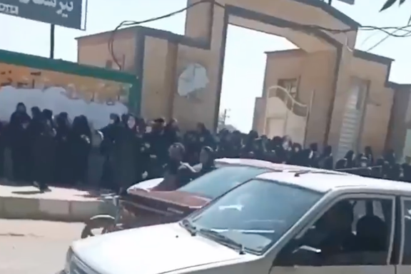 Parents gathered outside a school where unknown people conducted a gas attack