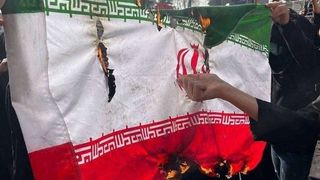 Iranian students burn flag, signaling a new phase in state–society rupture