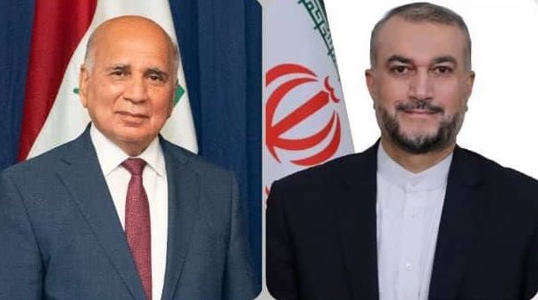 Iraqi Foreign Minister Fuad Hussein (left) and Iranian Foreign Minister Hossein Amir-Abdollahian (file photo)