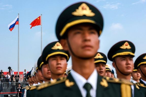 Chinese guards of honour take part in a ceremony to welcome Russian President Vladimir Putin, who arrives at an airport to attend the Shanghai Cooperation Organisation (SCO) summit in Tianjin, China August 31, 2025.