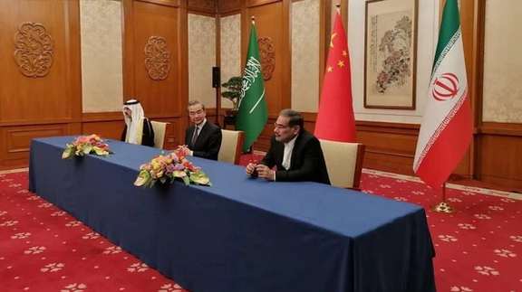 Former Secretary of Iran’s Supreme National Security Council, Ali Shamkhani (R) with China's Wang Yi and Saudi Arabia's Musaad bin Mohammed Al Aiban in Beijing on March 10, 2023