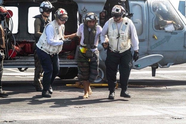 Sailors assigned to the USS Theodore Roosevelt Carrier Strike Group rescued two Iranian civilian mariners under distress in the U.S. Central Command (USCENTCOM) area of operations