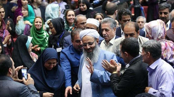 An undated phot showing Abdolhamid among Iranian supporters
