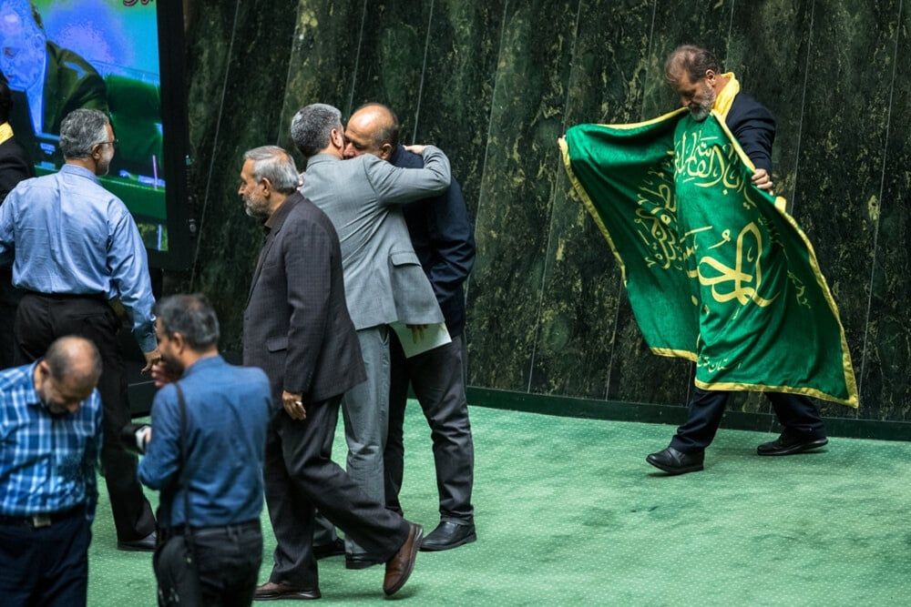 Denial dominates Iran’s parliament, but sanctions toll hard to ignore