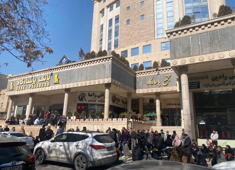Iranians lining up to buy dollars in Tehran on Monday