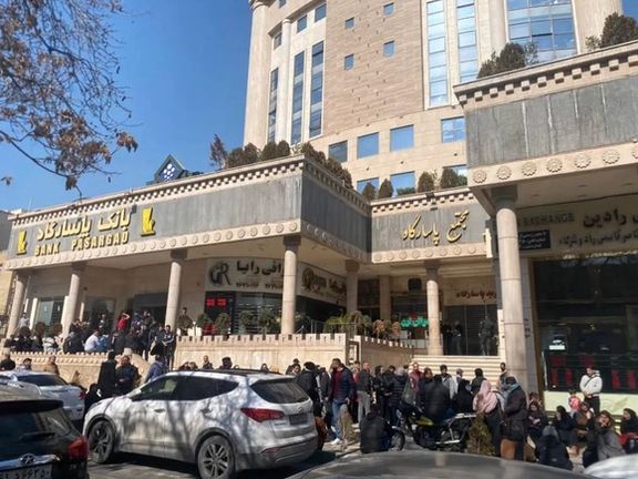 Iranians lining up to buy dollars in Tehran on Monday