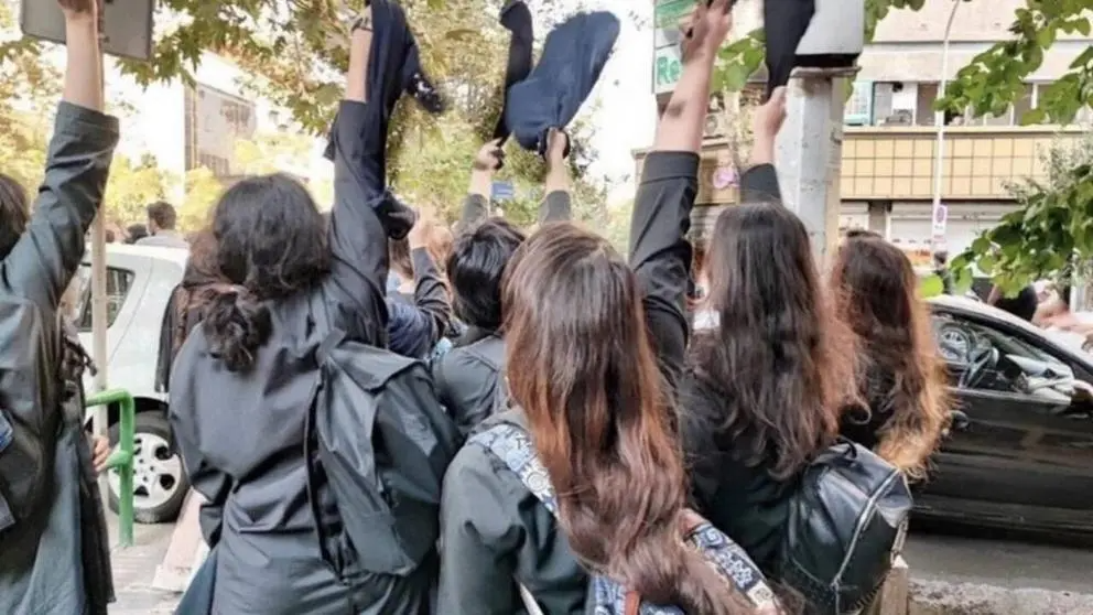 A group of teenage girls removed their hijabs during the Mahsa protests in 2022.