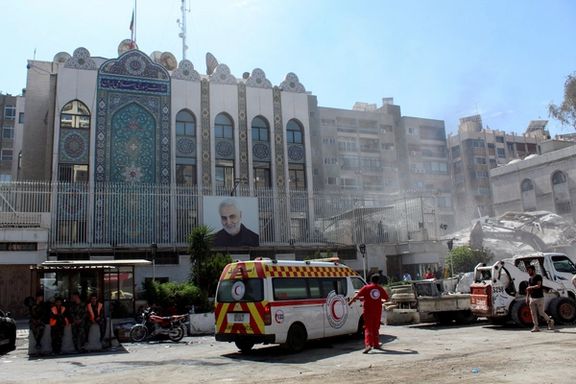 An ambulance is parked outside the Iranian embassy after a suspected Israeli strike on Monday on Iran's consulate, adjacent to the main Iranian embassy building, which Iran said had killed seven military personnel including two key figures in the Quds Force, in the Syrian capital Damascus, Syria April 2, 2024.