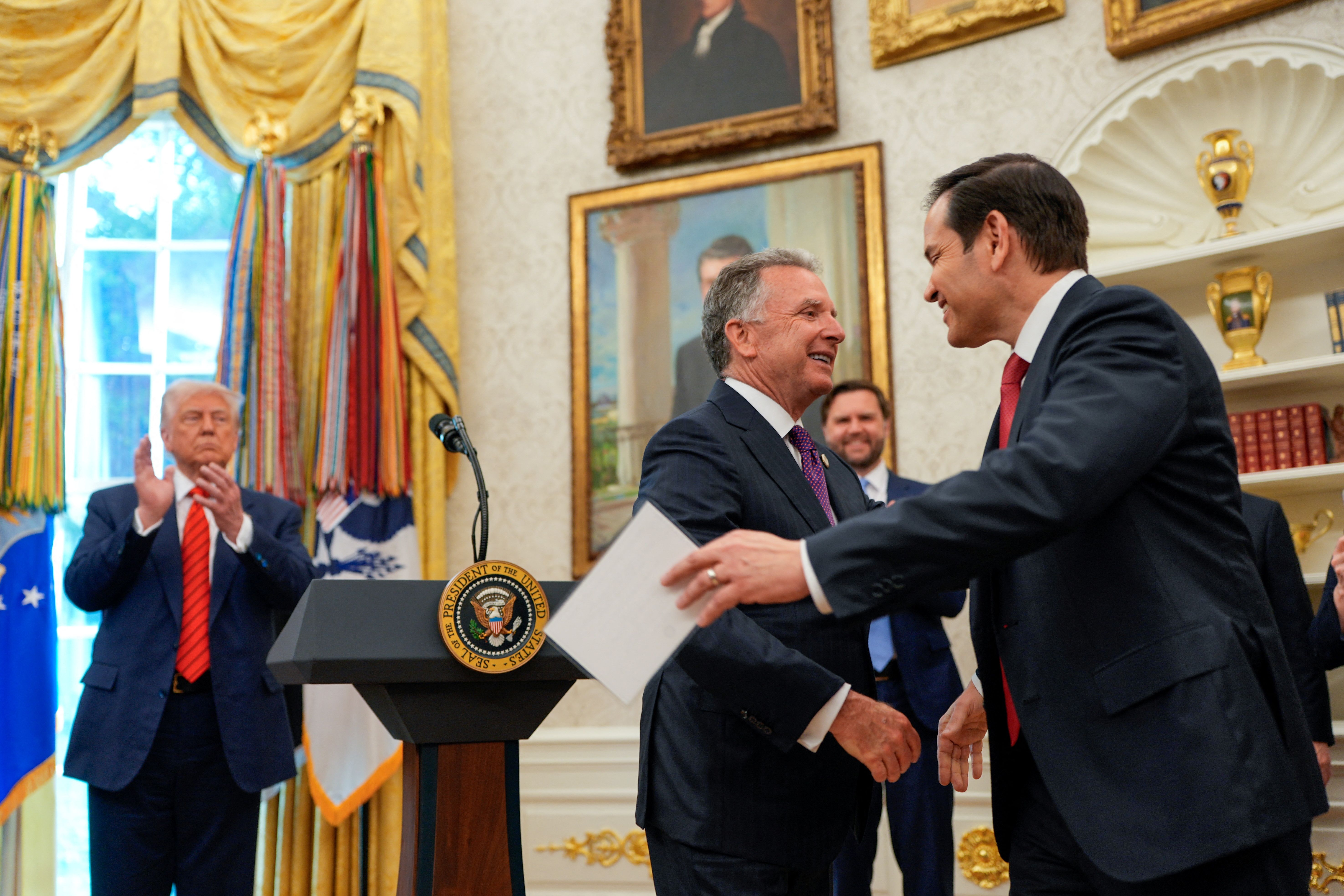 US Secretary of State Marco Rubio congratulates Special Envoy Steve Witkoff during his swearing-in ceremony in the Oval Office at the White House in Washington, DC, US, May 6, 2025.