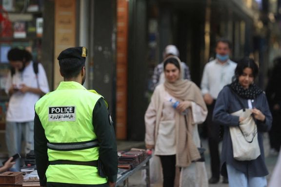 Iranian women walk on a street during the revival of morality police in Tehran, Iran, July 16, 2023.