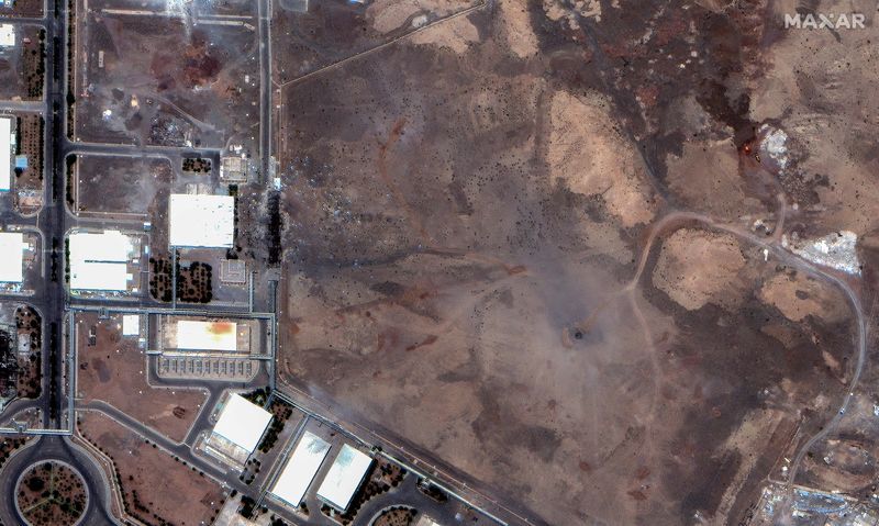 FILE PHOTO: A satellite image shows airstrike craters over the underground centrifuge halls of the Natanz Enrichment Facility, following U.S. airstrikes amid the Iran-Israel conflict, in Natanz County, Iran, June 22, 2025. Maxar Technologies/Handout via REUTERS