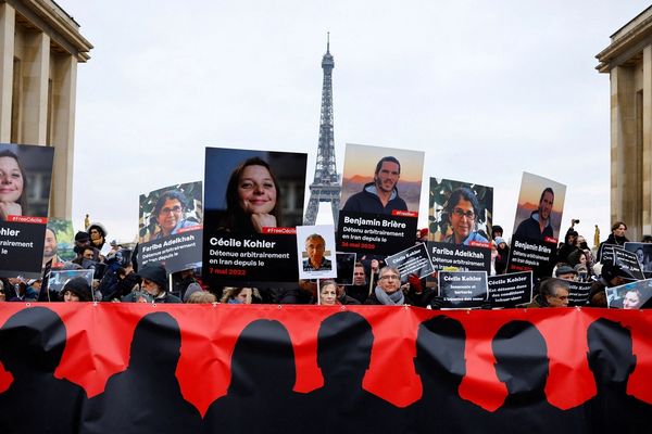 Macron vows tireless work to free French couple in Iran jail