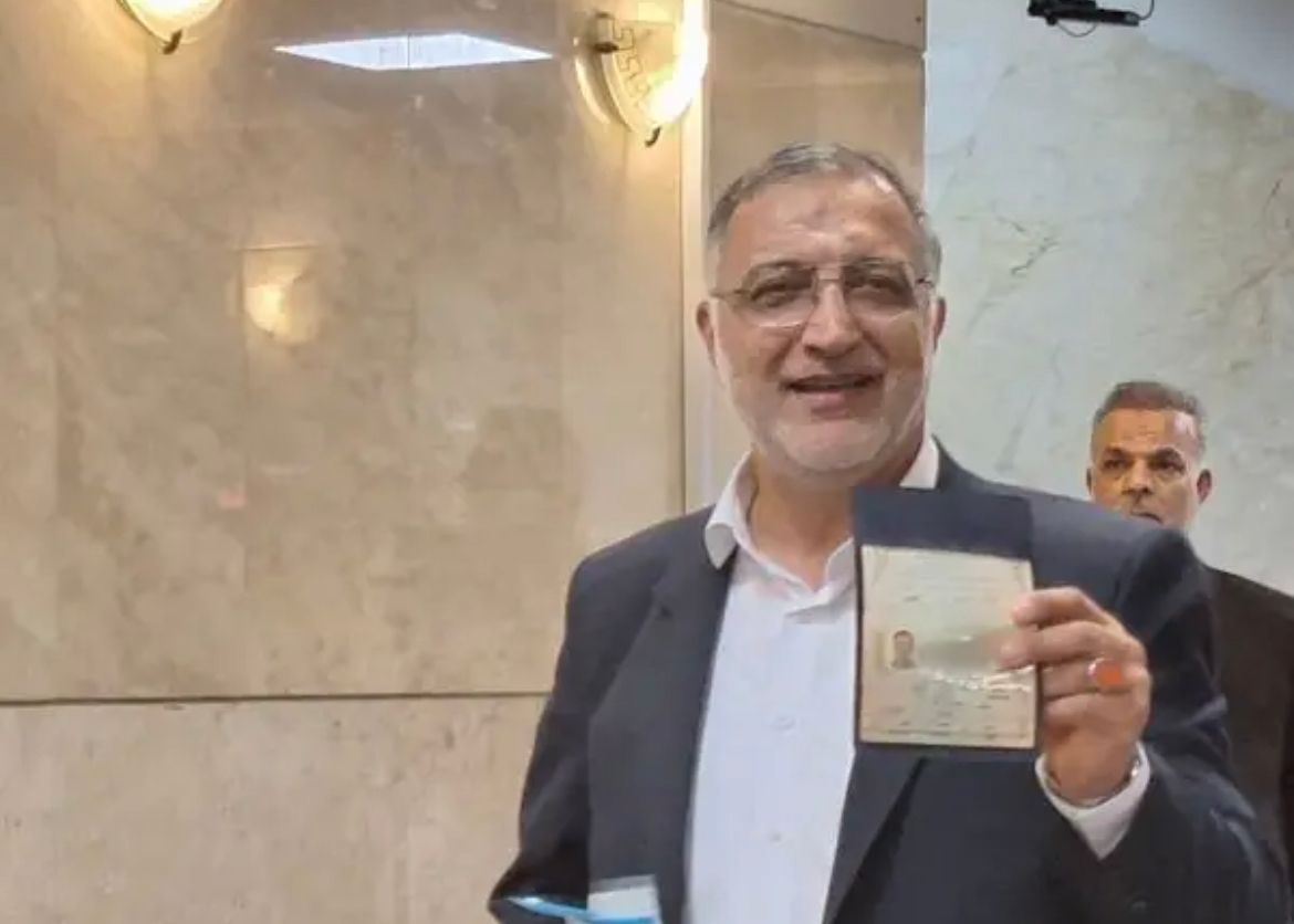 Tehran mayor Zakani showing his iD card during registration on June 1, 2024