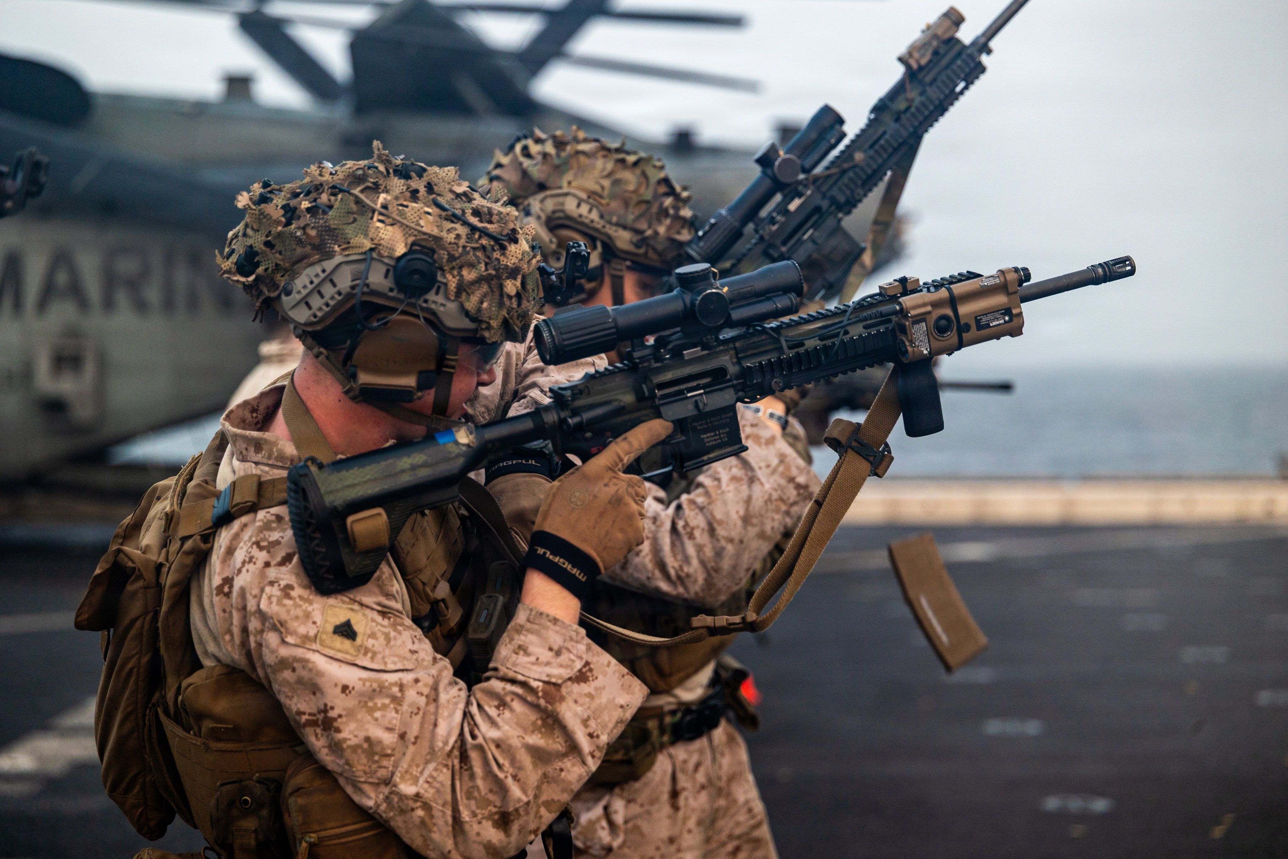 US Marines train on the flight deck of the USS Portland in the Arabian Sea. (CENTCOM/X)