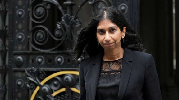 Britain's Home Secretary Suella Braverman walks outside 10 Downing Street in London, September 9, 2022.