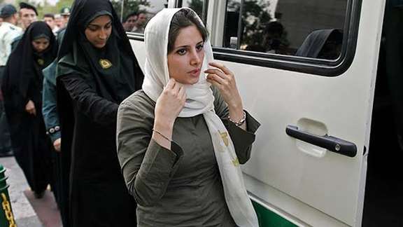 An Iranian woman confronted by hijab police