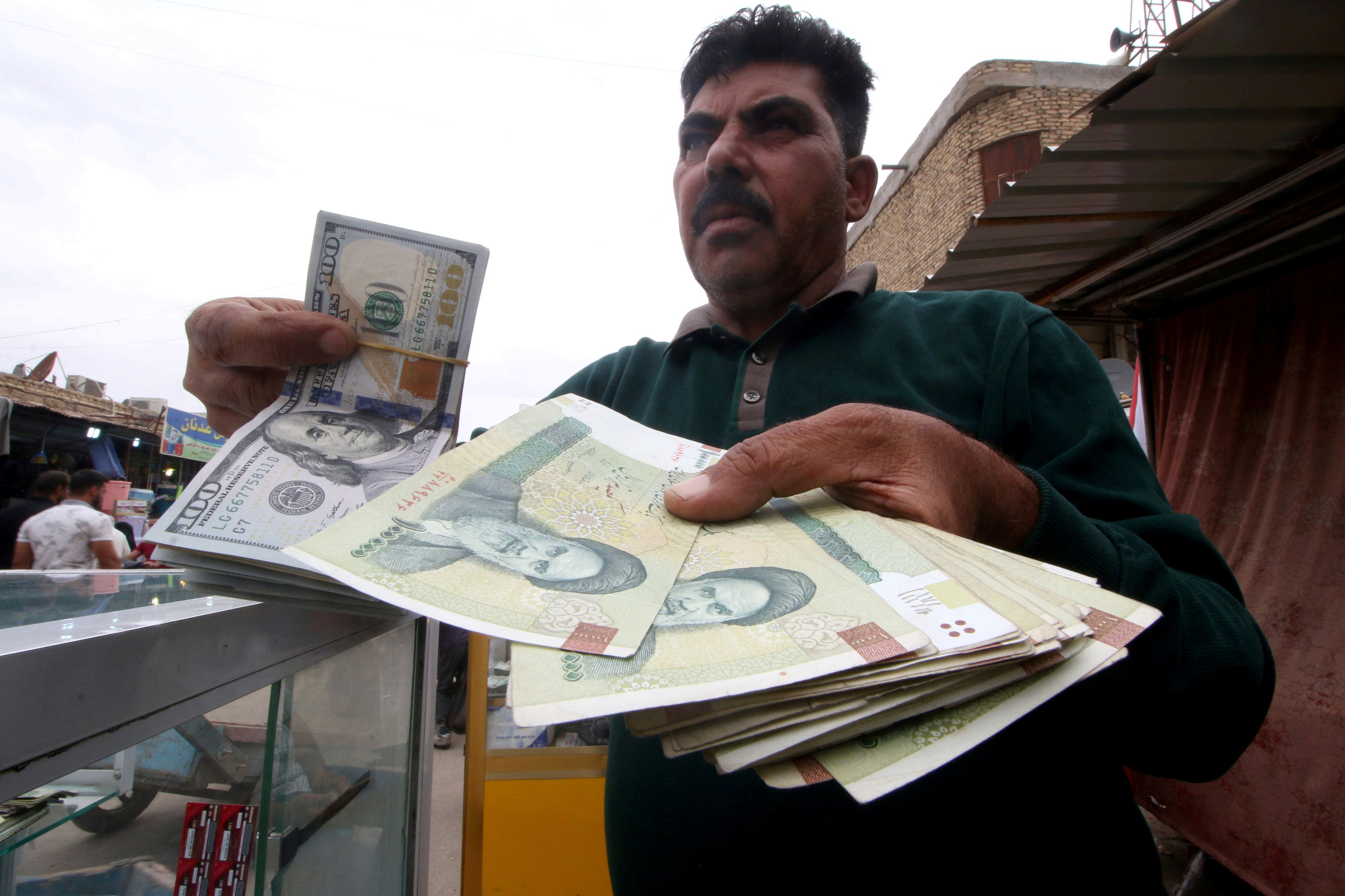 Iraq Bans 8 Banks From Dollar Trade To Curb Smuggling To Iran