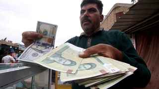 Iraq Bans 8 Banks From Dollar Trade To Curb Smuggling To Iran