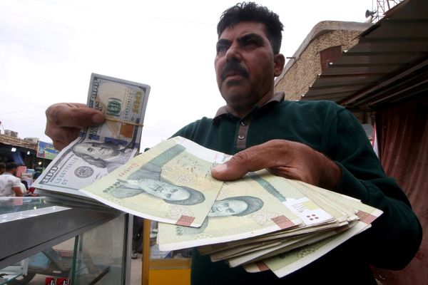 Iraq Bans 8 Banks From Dollar Trade To Curb Smuggling To Iran