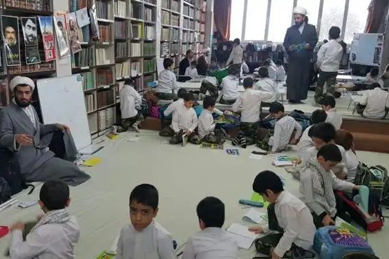 Iranian clerics teaching to schoolboys