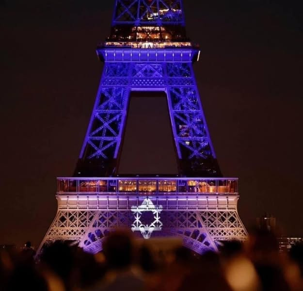 Eiffel Tower lit up in blue with the white Star of David following Hamas' October 7 attack on Israel