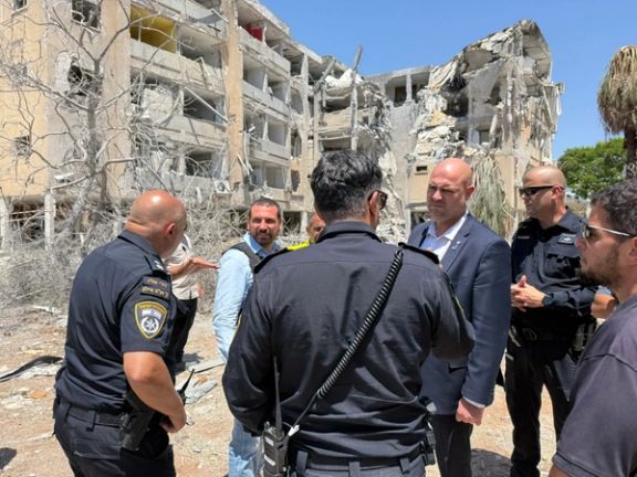 The speaker of Israel's Knesset, Amir Ohana, at the site of an Iranian attack