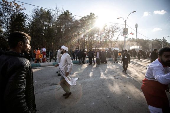 People gather at the scene of explosions during a ceremony held to mark the death of late Iranian General Qassem Soleimani, in Kerman, Iran, January 3, 2024.