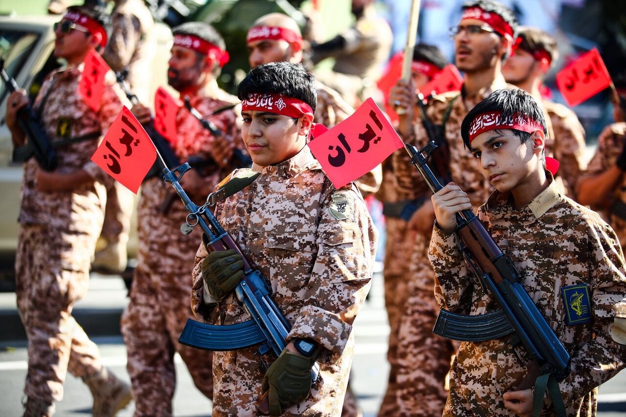 Children carrying rifles take part in a Janfada mobilisation rally in Iran, September 18, 2026