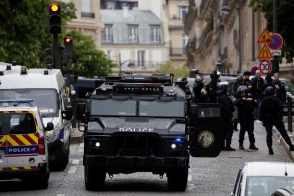 French police and members of French special police forces of Research and Intervention Brigade (BRI) secure the area near Iran consulate where a man is threatening to blow himself up, in Paris, France, April 19, 2024.
