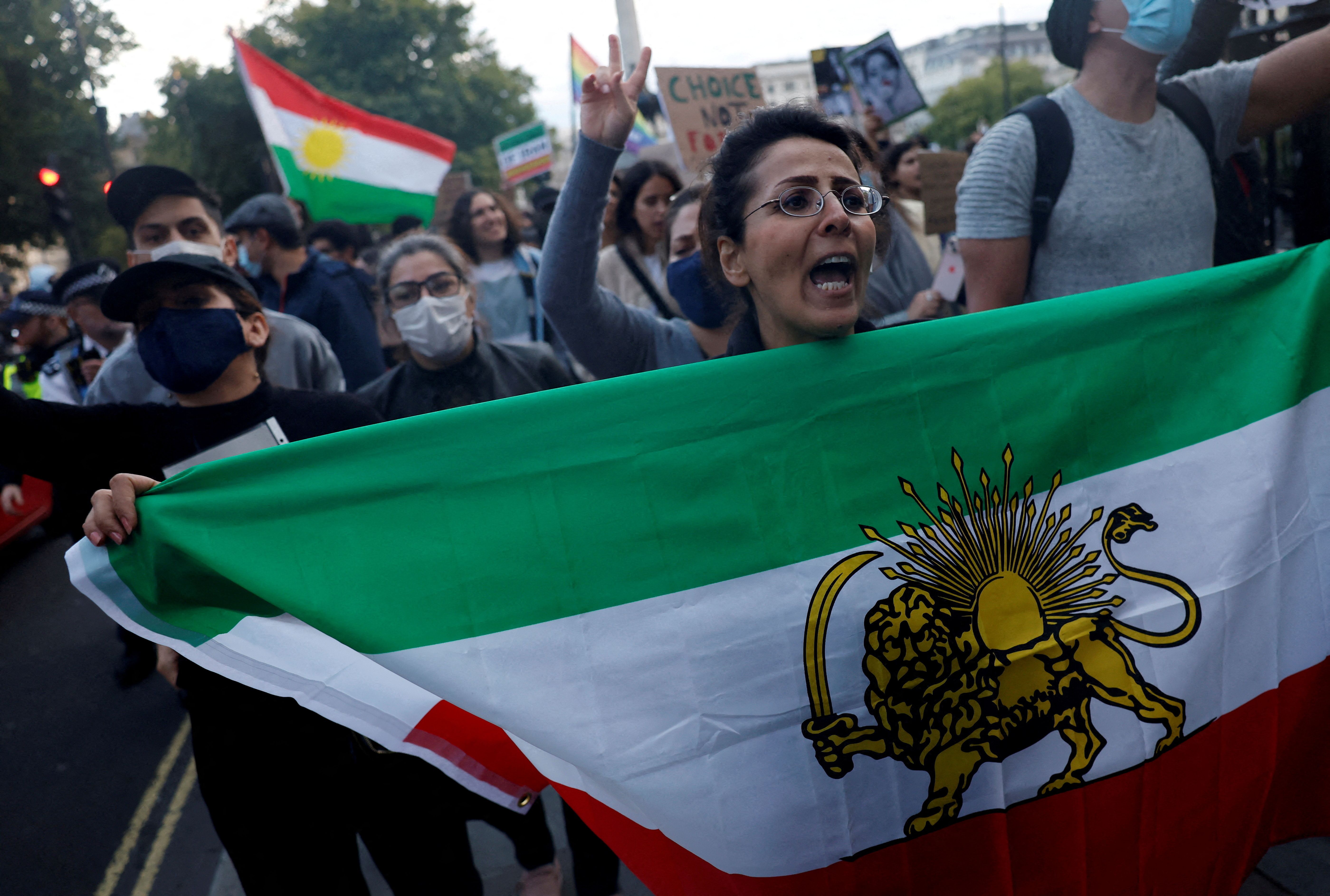 Protestors stand in solidarity with Iranian women after the death of Mahsa Amini, in London, Britain September 24, 2022.