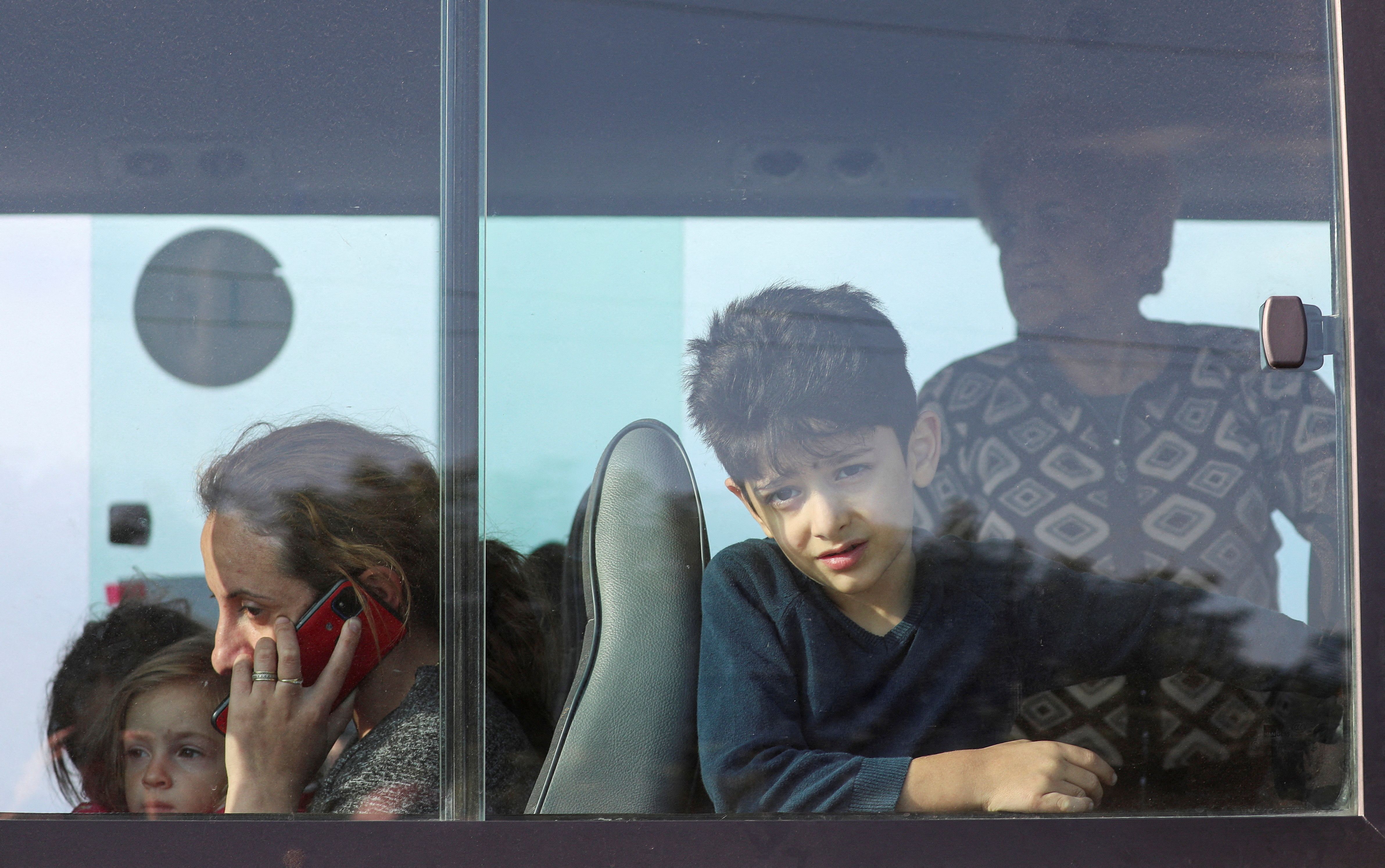Refugees from Nagorno-Karabakh region are seen in a bus upon their arrival at a checkpoint in the village of Kornidzor, Armenia, September 24, 2023. 